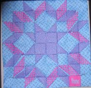 Carpwheel paper quilt by Rona